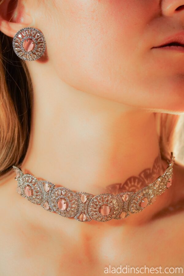 Elegant pink gemstone necklace and earrings