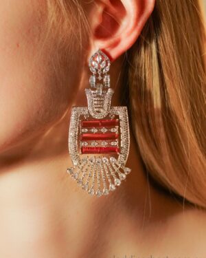 Elegant ruby and crystal chandelier earrings close-up