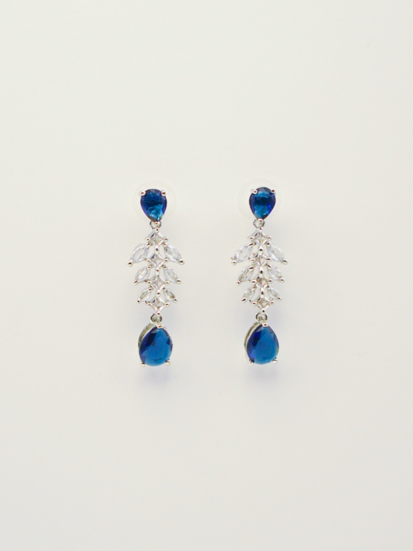Blue gemstone dangling earrings with silver accents