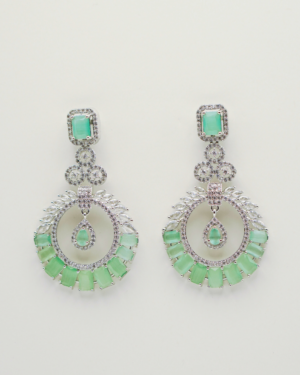 Elegant green gemstone and silver chandelier earrings.