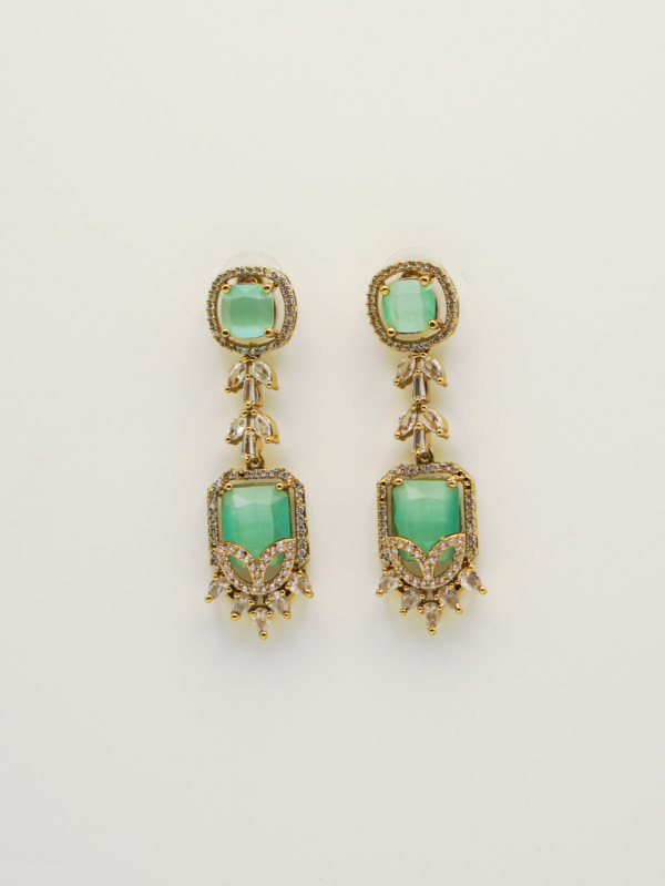 Elegant green gemstone dangling earrings with gold accents