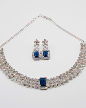 Elegant necklace and earrings set with blue gemstones