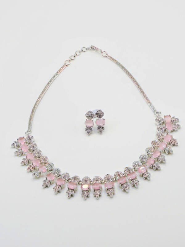 Elegant pink gemstone necklace and earrings set.