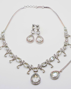 Crystal necklace and earrings set on display.